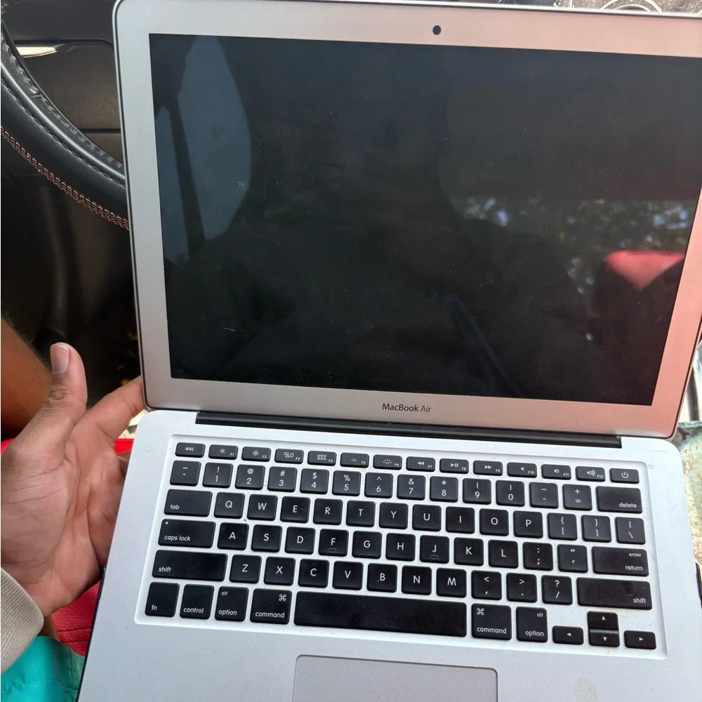 Apple Laptop with Silver Finish and Sticker. 2015